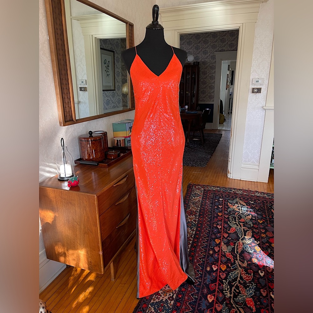 KauffmanFranco sleeveless sequin gown in tomato/charcoal. Side Zipper.